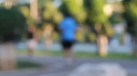 Blurred motion, people exercise in park. 스톡 동영상 55402775