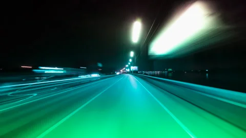 Blurred Motion Through Futuristic Bridge at Night. Stock Footage 335382531