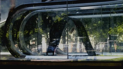 Blurred motion on transparent escalator time lapse Stock Footage 64596731