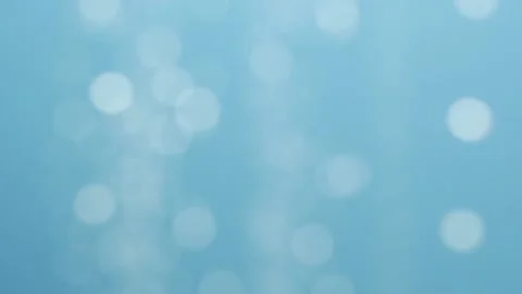 Blurred moving abstract white color light particles, blue background, lens flare Stock Footage 149089532