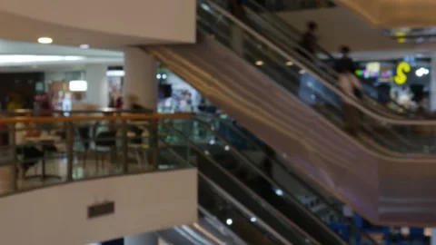 Blurred of multiple escalators in a shopping mall Stock Footage 323384003