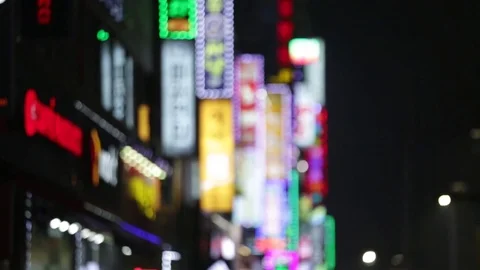 Blurred neon signs Stock Footage 76258624