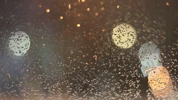 Blurred night light snow rain fall bokeh Video stock 85676496