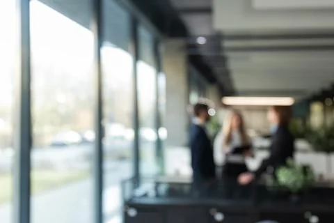 Blurred office background with employees Stock Photos