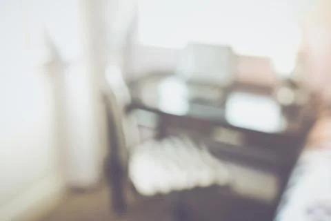 Blurred Office in Bedroom with Computer applying Retro Instagram Style Filter Stock Photos