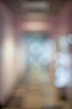 Blurred office corridor. Stock Photos