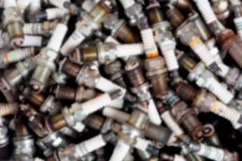 The blurred old spark plug are in part of a car Stock Photos