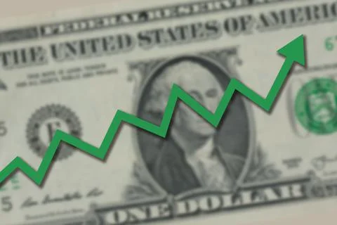 Blurred one US dollar bill with green stock market chart arrow going up. Stock Photos