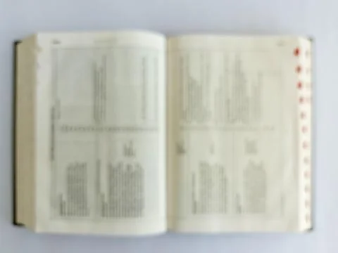 Blurred Open Bible in Soft Focus Stock Photos