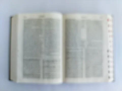 Blurred Open Bible in Soft Focus Stock Photos