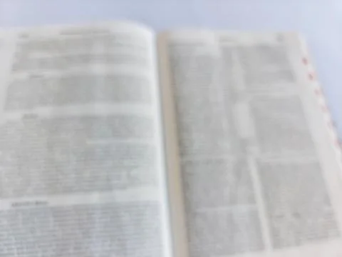 Blurred Open Bible in Soft Focus Stock Photos