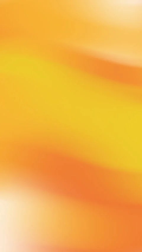 Blurred orange and yellow background. Vidéo 310012287