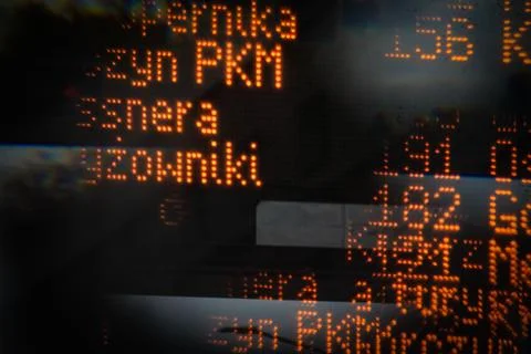 Blurred orange digital display with text and numbers Stock Photos