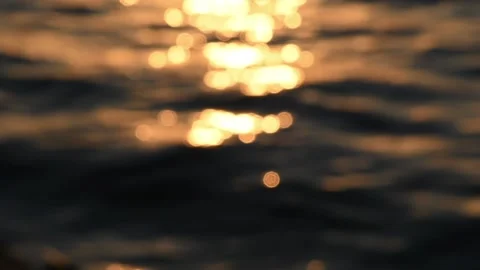 Blurred orange sea at sunset Stock Footage 195933285