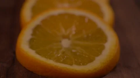 Blurred Orange Slices Panning up Stock Footage 130908164