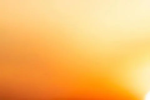 Blurred orange yellow gradient background for design Stock Photos