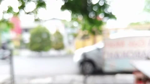 Blurred out focus defocused bokeh view of asian road traffic in the morning Stock Footage 147110251