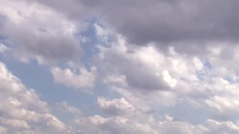 Blurred, out-of-focus, fast moving in light haze textured white cumulus cloud Video stock 319221850