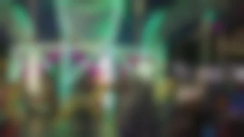 Blurred out of focus neon lights bokeh background at night. Stock Footage 344966974