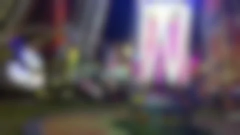 Blurred out of focus neon lights bokeh background at night. Stock Footage 344966980