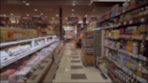 Blurred out of focus slow motion view while walking through aisle row of sh.. Stock Footage 223187066