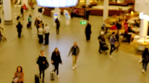 Blurred out of focus video of passengers walking in the airport terminal Stock Footage 150353170