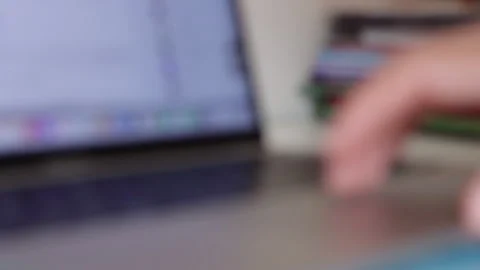 Blurred Out Person Scrolling Through Social Media On Laptop Stock Footage 248763071