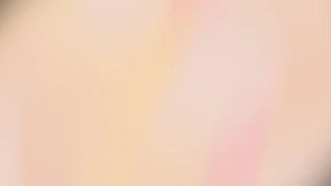 Blurred pale peach background. Vidéo 311403910