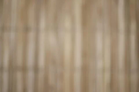 Blurred pattern wood - braided straw fence - handcrafted and beautiful textur Stock Photos