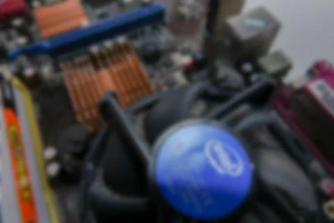 Blurred PCB Closeup of electronic circuit board with CPU processor. 스톡 사진
