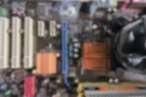 Blurred PCB Closeup of electronic circuit board with CPU processor. Foto stock