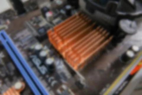 Blurred PCB Closeup of electronic circuit board with CPU processor. Stockfoto's