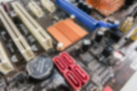 Blurred PCB Closeup of electronic circuit board with CPU processor. Foto stock