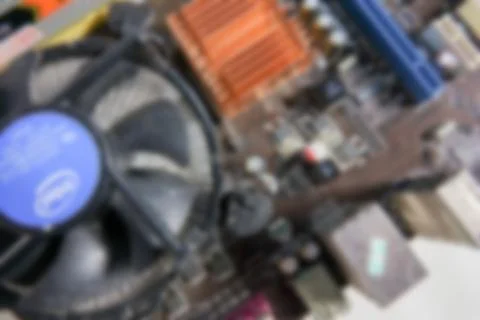 Blurred PCB Closeup of electronic circuit board with CPU processor. Foto stock