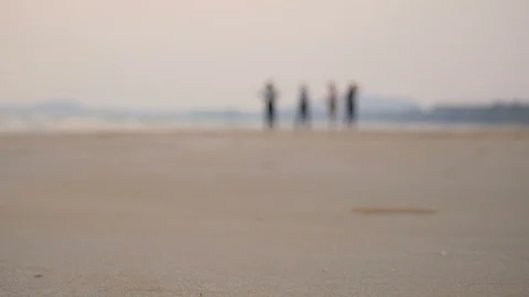 Blurred people on the beach and the sand with sea wave Stock Footage 102418416