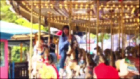 Blurred, people on a carousel at the theme park Stock Footage 289390190