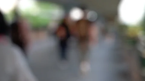 Blurred people crossing pedestrian bridge; Slow Motion Video stock 125054053
