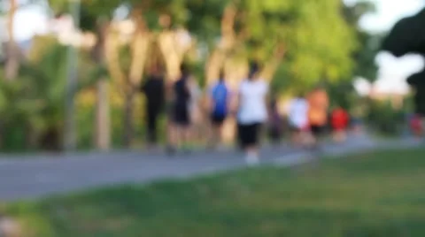 Blurred people exercise in park. 스톡 동영상 55404612