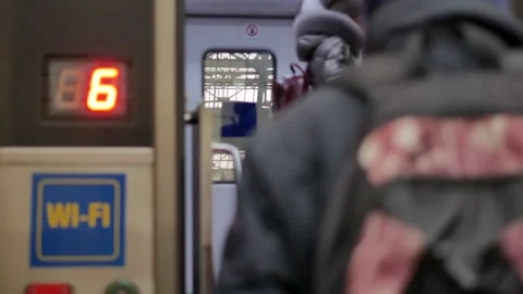 Blurred people get onto the train from Lviv, Ukraine to Przemysl, Poland - 4K Stock Footage 178479487