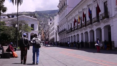 Blurred people walking over the square called San Francisco in Quito Stock Footage 153721495