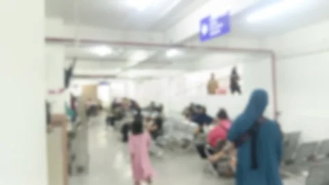Blurred perspective of a bustling waiting area filled with diverse individu.. Stock Footage 303831537