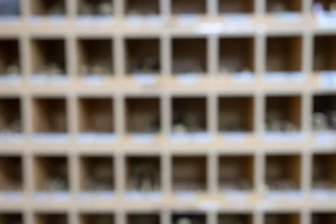 Blurred photo with rectangular cells made of wood Foto stock