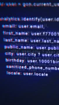 Blurred programming code on dark screen, symbolizing software development, da Stock Illustration