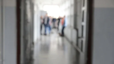 Blurred Pupils walking down school corridor. Inside school. Stock Footage 99151762