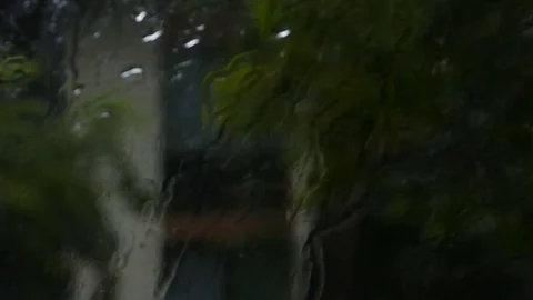 Blurred rainy window - Bus drive - Slow motion Video stock 78016269