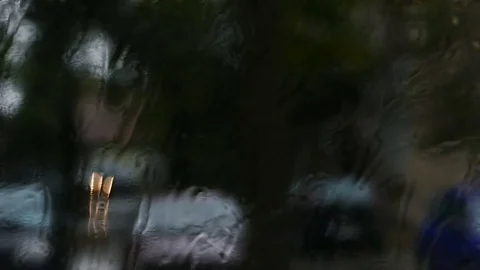 Blurred rainy window - Bus drive - Slow motion Stock-Footage 78016396