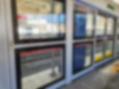 Blurred rectangular windows with black frames and colorful interior reflectio Stock Photos