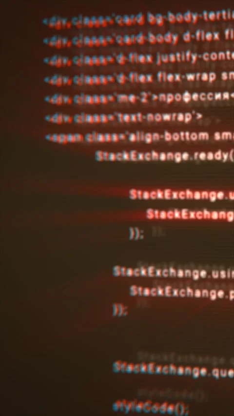 Blurred red-blue distorted code lines displayed on a dark screen, creating .. Stock Footage 322127917