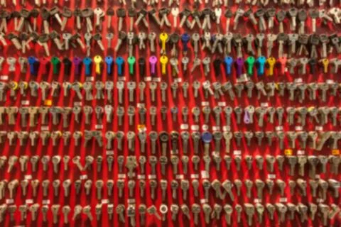 Blurred red wall with keys background Stock Photos