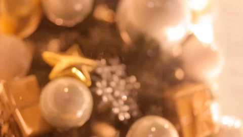 Blurred reflection of people walking on the background decorated Christmas tree. Stock Footage 69924939